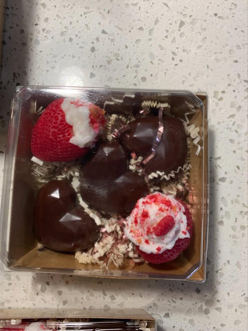 Stuffed strawberries with chocolate hearts