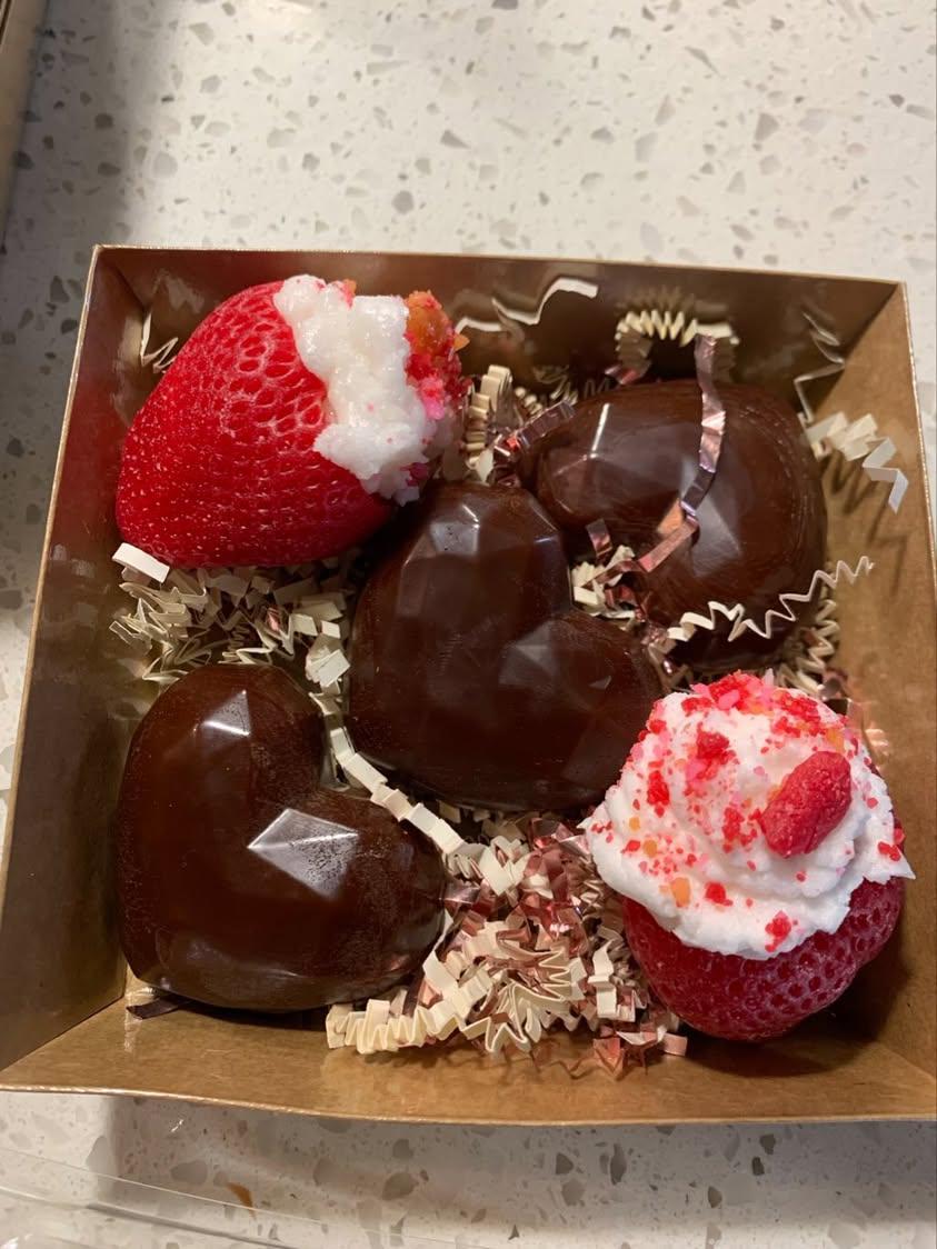 Stuffed strawberries with chocolate hearts